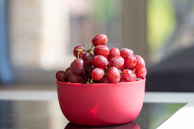 Close-up of strawberries in bowl at home