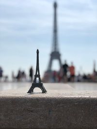 Eiffel tower souvenir on retaining wall