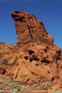 Rock formation at valley of fire state park against clear blue sky