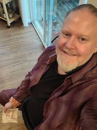 Portrait of smiling man at home