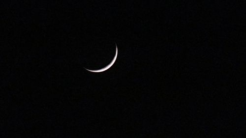 Low angle view of moon in sky