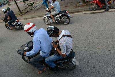 High angle view of people on road