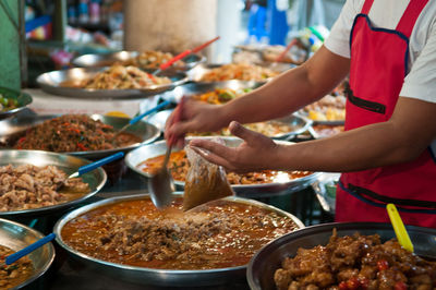 Man preparing food in kitchen