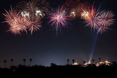 The most famous firework festival in  thailand.low angle view of firework display at night.