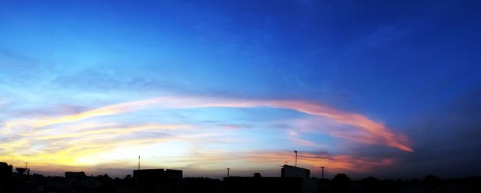 Low angle view of cloudy sky at sunset