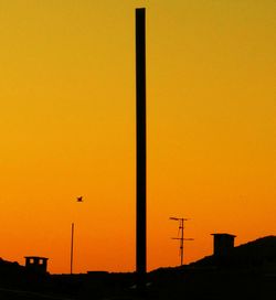 View of built structure at sunset