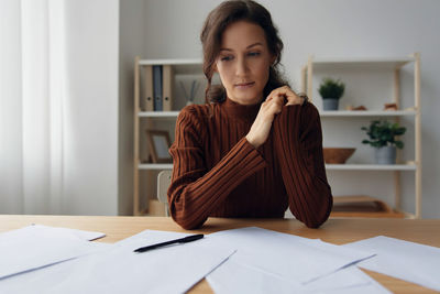 Businesswoman brainstorming in office