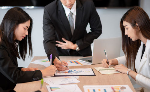 Business colleagues working at office