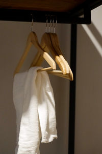 Close-up of clothes hanging on window