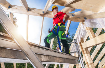 Low angle view of man standing on steps