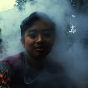 Portrait of young man smiling