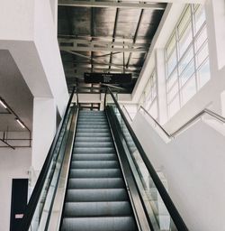 Low angle view of escalator in building