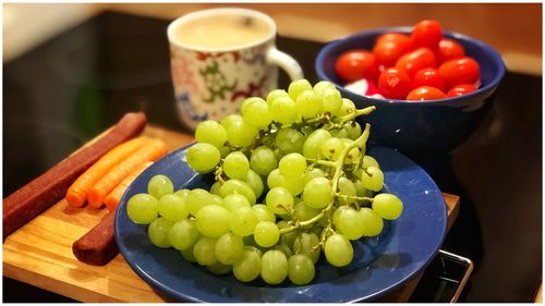 Close-up of fruits in bowl on table