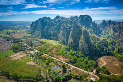 High angle view of trees and mountains against sky