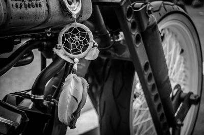 Close-up of motorcycle hanging