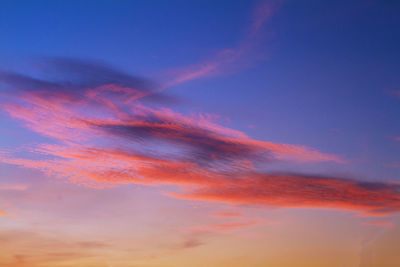 Low angle view of dramatic sky during sunset