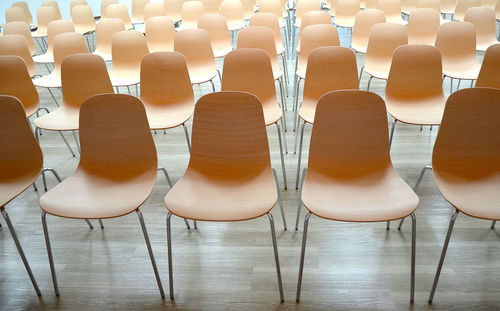 High angle view of empty chairs and table