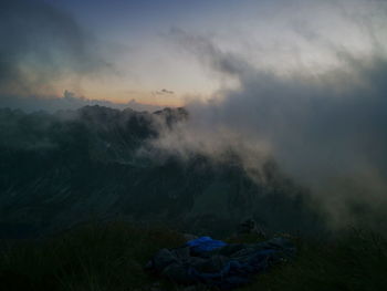 Scenic view of mountains against sky during sunset