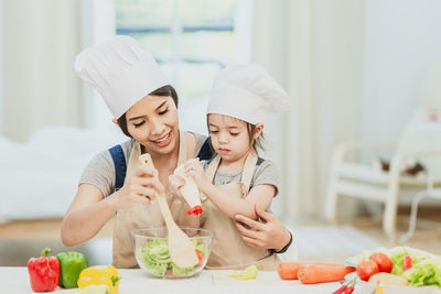 Young woman preparing food