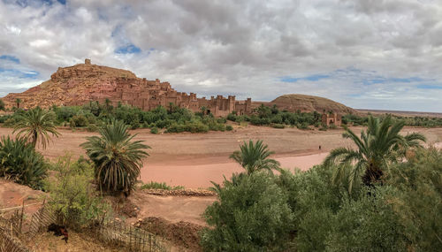 Ancient town in a distance - scenic view of landscape against sky