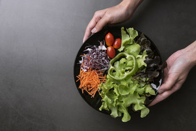 High angle view of person preparing food in bowl