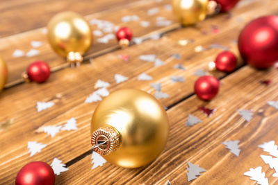 High angle view of christmas decorations on wooden table