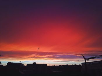 Silhouette of building at sunset