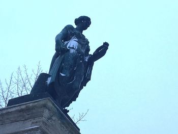 Low angle view of statue against clear sky