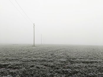 Scenic view of field against sky. morning fog over the lands. mysticaly nowhere. no one is heere