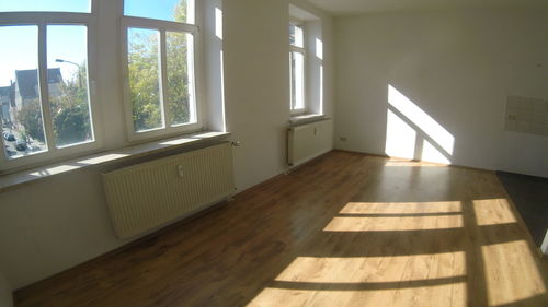 Sunlight falling on hardwood floor in house