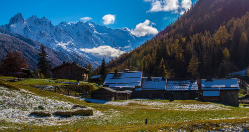 Scenic view of snowcapped mountains against sky