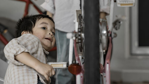 Portrait of cute boy looking away