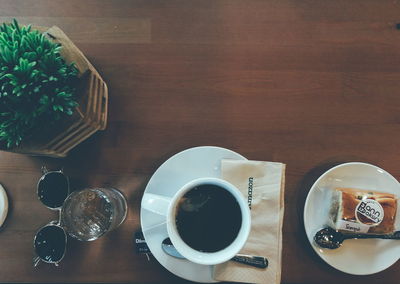 High angle view of coffee cup on table