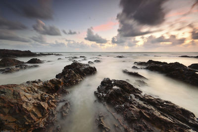 Scenic view of sea against sky during sunset