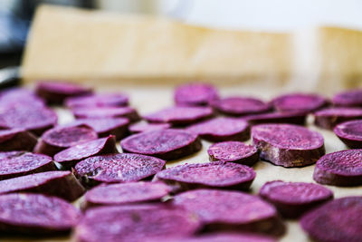 Close-up of chopped sweet potato on cutting board 