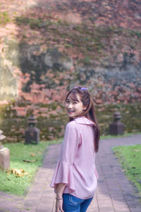 Young woman standing on street