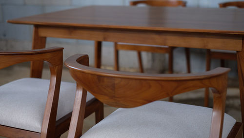 Empty chairs and table in restaurant