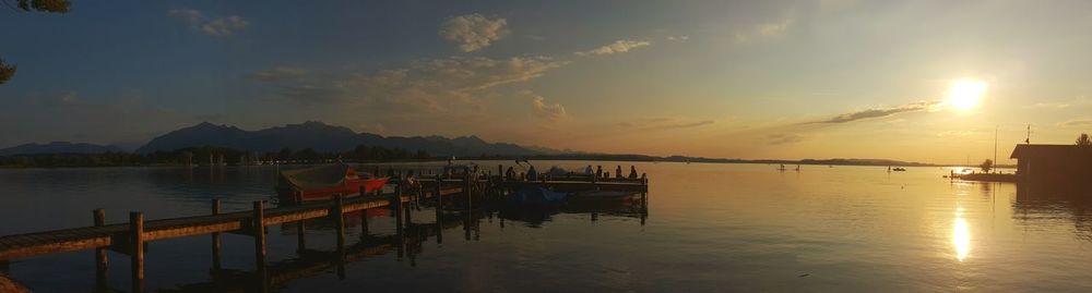 Panoramic view of sea against sky during sunset