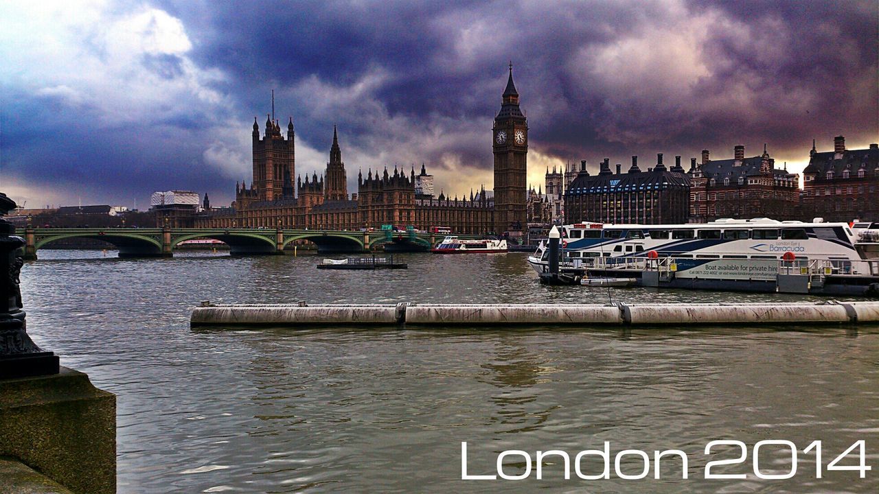 architecture, building exterior, built structure, sky, river, water, city, transportation, cloud - sky, nautical vessel, waterfront, bridge - man made structure, mode of transport, cloudy, travel destinations, travel, famous place, connection, capital cities, cloud