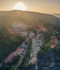 Scenic view of landscape against sky during sunset