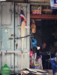 Woman standing in store for sale