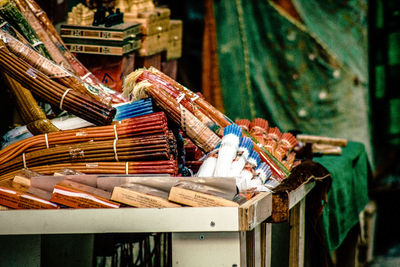 Close-up of stack of table at market stall
