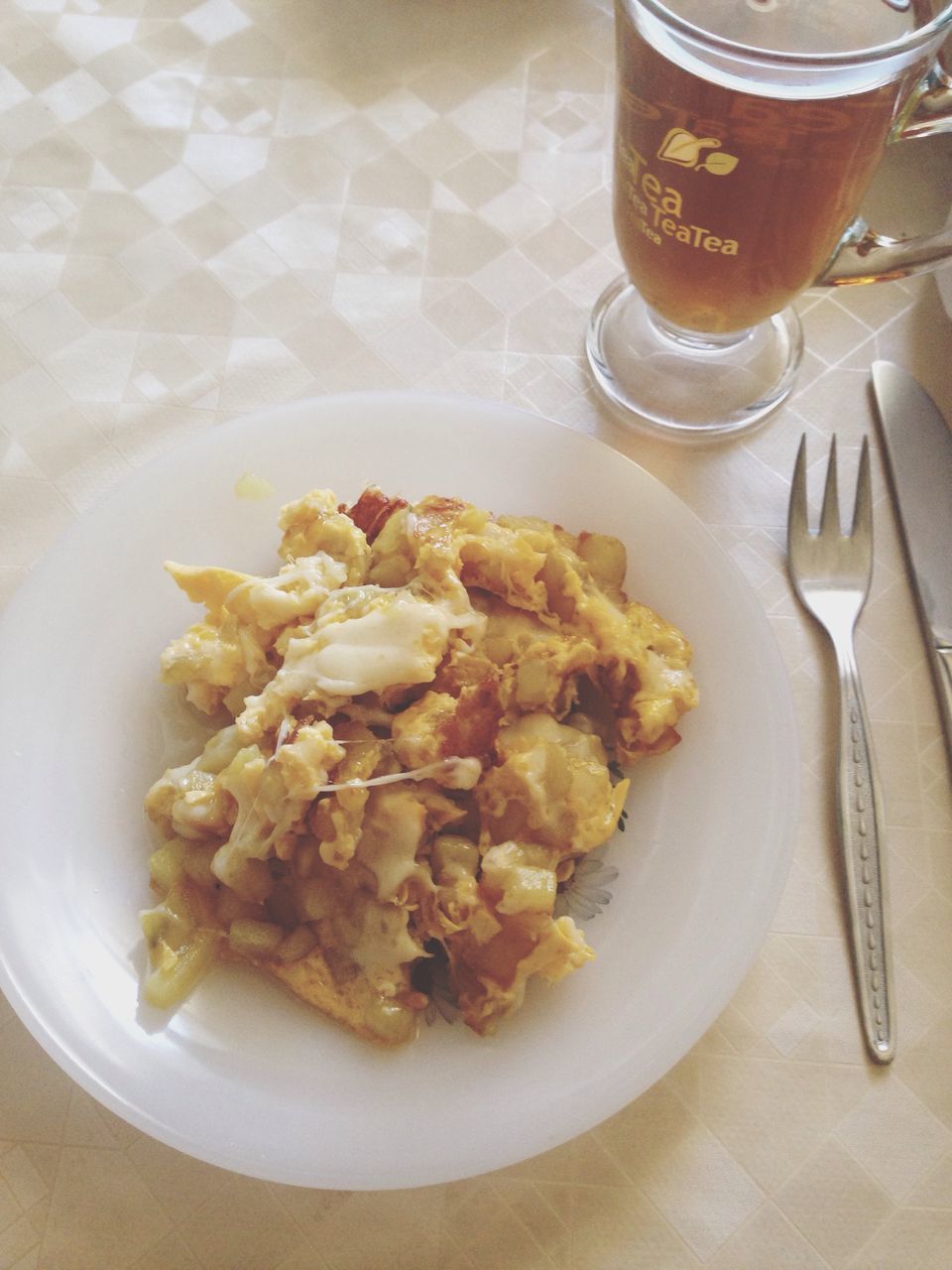 food and drink, indoors, table, drink, freshness, food, still life, plate, refreshment, drinking glass, healthy eating, ready-to-eat, high angle view, fork, serving size, coffee cup, spoon, coffee - drink, bowl, close-up