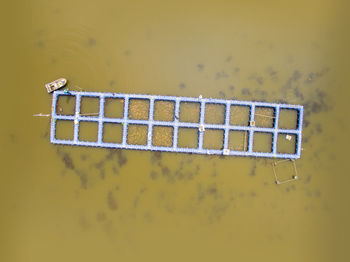 Aerial view of traditional fishing cage in river