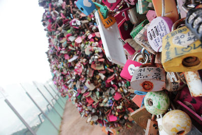 Close-up of padlocks hanging on metal