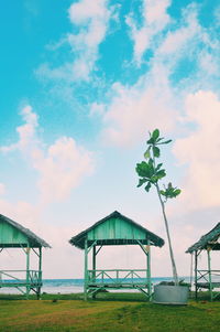 Built structure on beach against sky