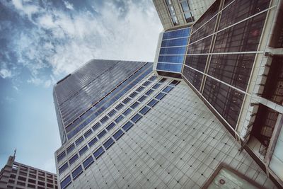 Low angle view of skyscraper against sky