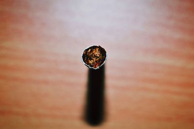 Close-up of cigarette on table