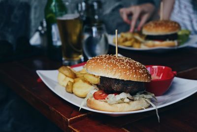 Close-up of burger in plate on table