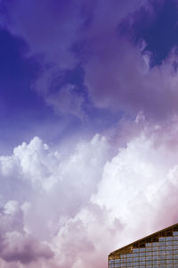 Low angle view of building against blue sky